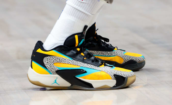 Dallas Mavericks guard Luka Doncic's black and yellow Jordan Brand sneakers.